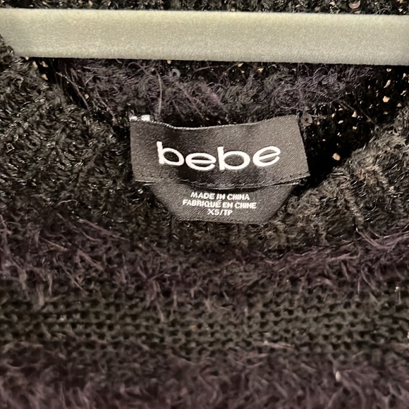 Womens long sleeved black sweater. - Picture 4 of 7